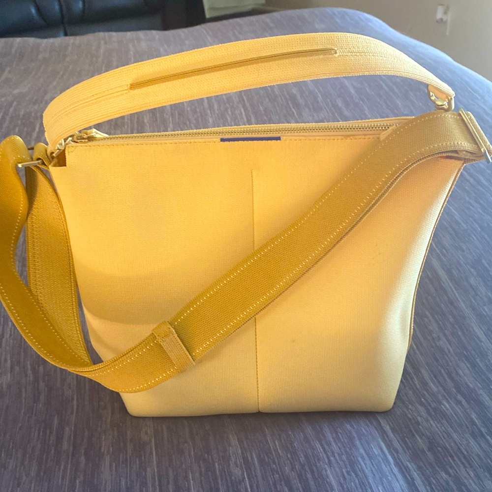 COPY - COPY - Rothy’s butter color bucket bag with detachable handle, crossbody.